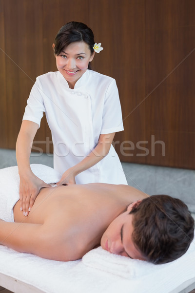 Homme masseur Retour spa centre Photo stock © wavebreak_media