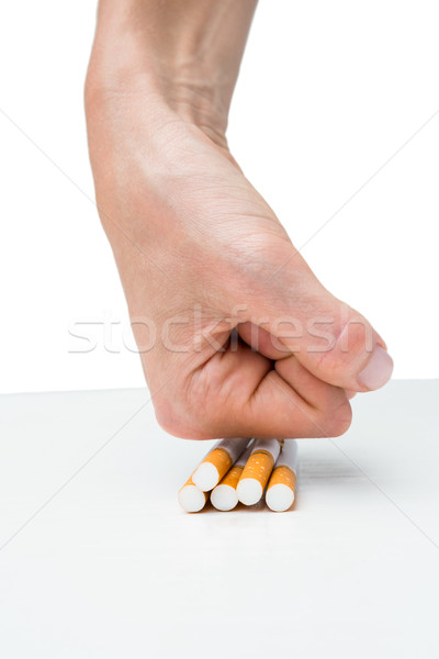 Main lot cigarettes blanche femme fumée [[stock_photo]] © wavebreak_media
