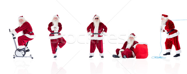 Composite image of different santas Stock photo © wavebreak_media