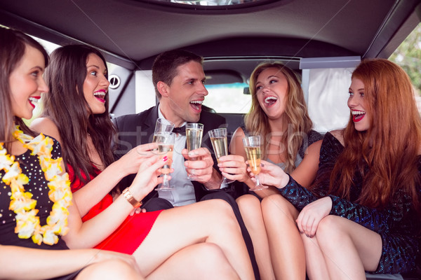 Boldog barátok iszik pezsgő limuzin bulizás Stock fotó © wavebreak_media