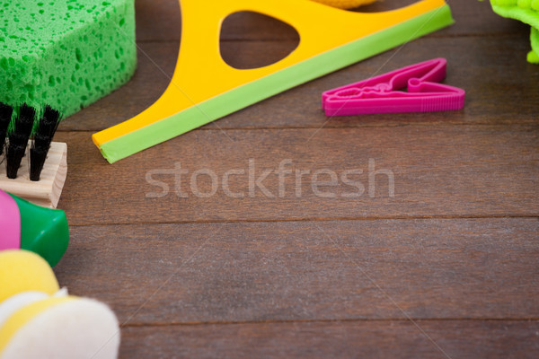 Cleaning equipments arranged on wooden floor Stock photo © wavebreak_media