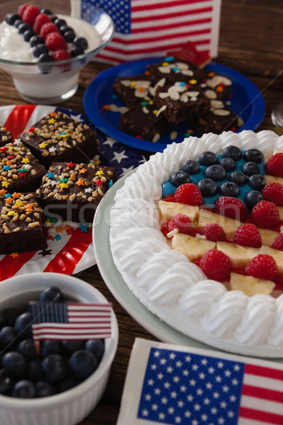 Fruitcake served in plate on wooden table Stock photo © wavebreak_media