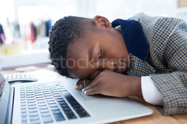 Businessman taking a nap on laptop Stock photo © wavebreak_media