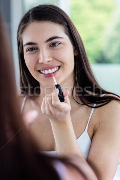 Esmer dudak parlatıcısı banyo kadın mutlu Stok fotoğraf © wavebreak_media