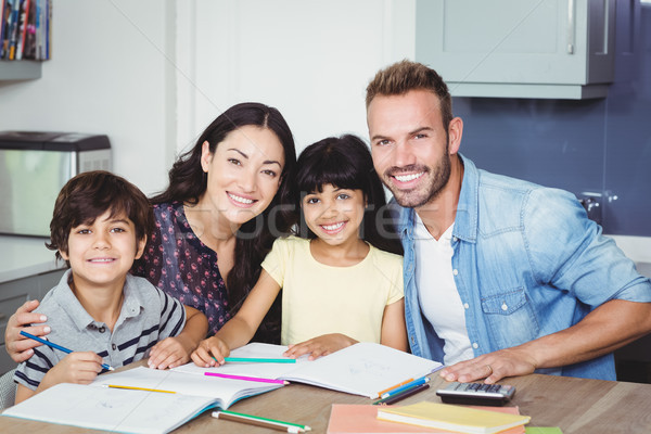 [[stock_photo]]: Portrait · heureux · parents · enfants · devoirs · bureau