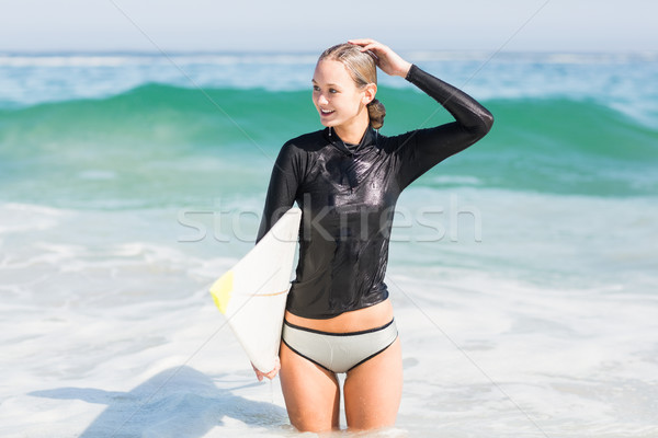 Mulher prancha de surfe praia mar Foto stock © wavebreak_media