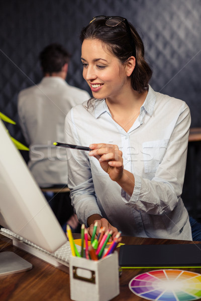 Creative femme d'affaires travail graphique comprimé bureau [[stock_photo]] © wavebreak_media