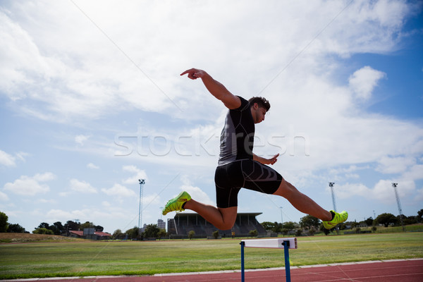 Foto stock: Atleta · saltar · hombre · deportes · ejecutando