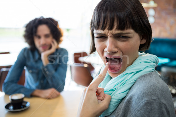 Woman showing burned tongue Stock photo © wavebreak_media