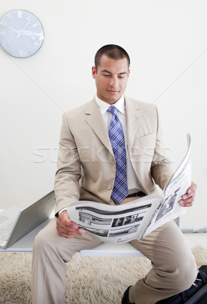 Confident manager reading a newspaper Stock photo © wavebreak_media