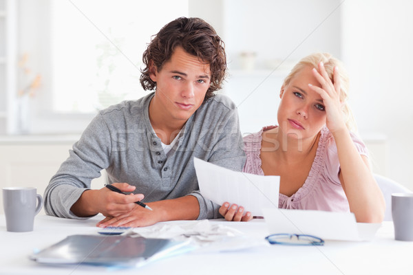 worried couple listing expenses in the living room Stock photo © wavebreak_media