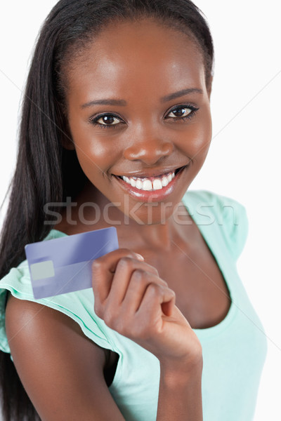 Glimlachend jonge vrouw nieuwe creditcard witte achtergrond Stockfoto © wavebreak_media