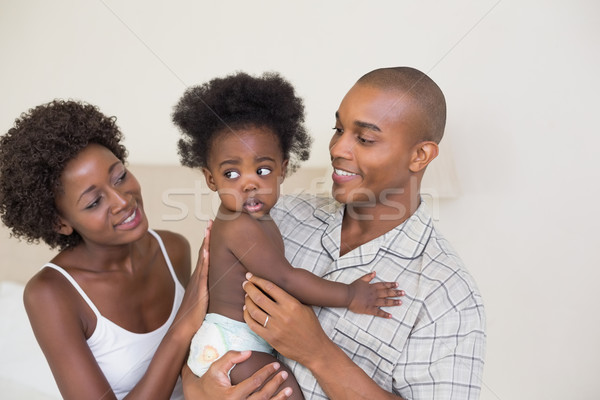 Boldog szülők kislány otthon hálószoba ház Stock fotó © wavebreak_media