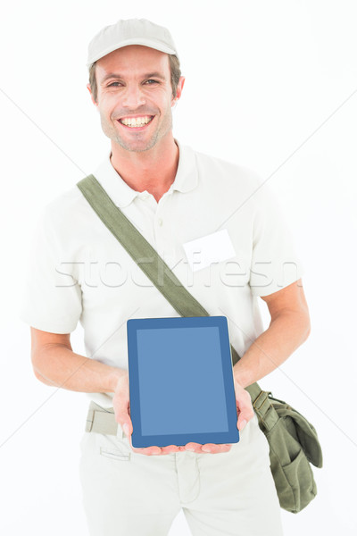 Mosolyog futár mutat digitális tabletta portré Stock fotó © wavebreak_media