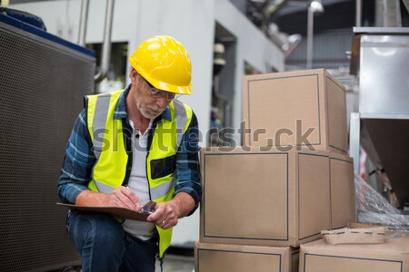 Worker preparing goods for dispatch Stock photo © wavebreak_media