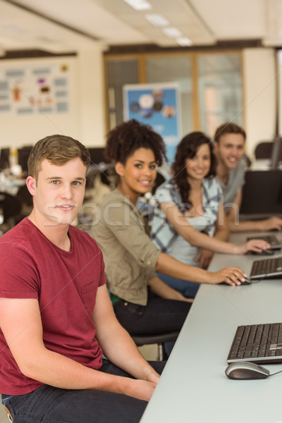 Sınıf arkadaşları çalışma bilgisayar odası üniversite bilgisayar okul Stok fotoğraf © wavebreak_media