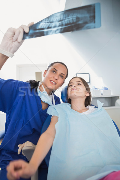 Pediatric dentist explaining to young patient the x-ray Stock photo © wavebreak_media