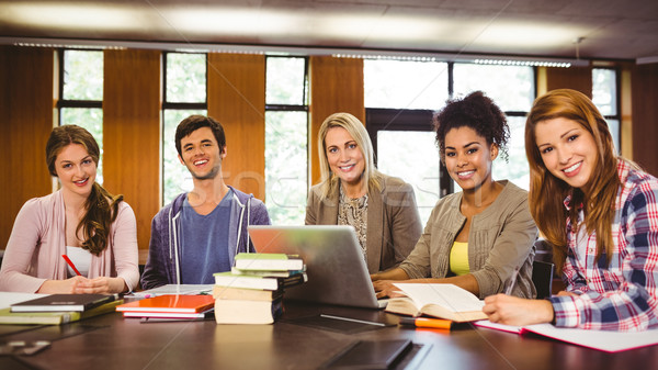 Souriant élèves ordinateur livre [[stock_photo]] © wavebreak_media