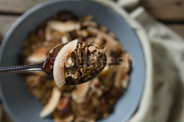 Breakfast cereal in bowl on wooden table Stock photo © wavebreak_media