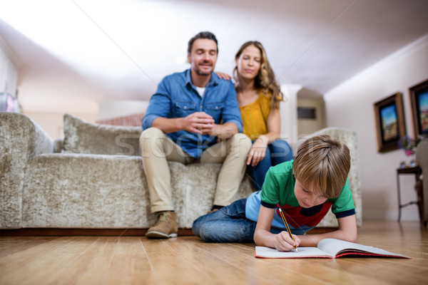 Jongen huiswerk ouders vergadering sofa vrouw Stockfoto © wavebreak_media