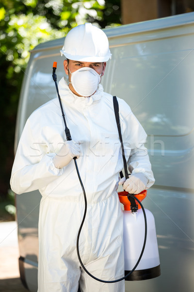 Portrait of pest control man standing next to a van Stock photo © wavebreak_media