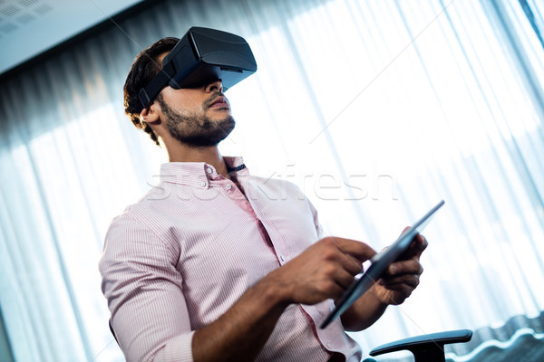 Businessman using an oculus Stock photo © wavebreak_media