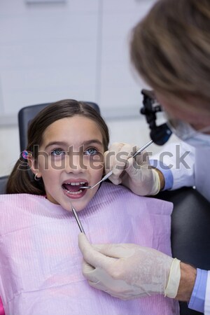 Dentista examinar femenino paciente dientes dentales Foto stock © wavebreak_media