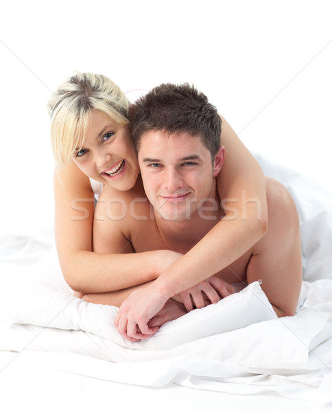 Amoroso casal relaxante cama menina Foto stock © wavebreak_media