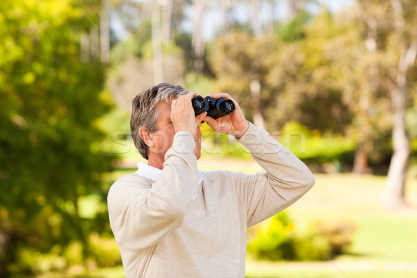 Mature man birds watching Stock photo © wavebreak_media