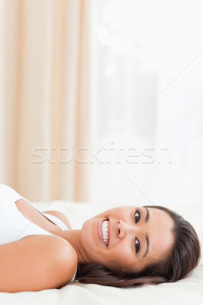 Sevimli kadın yatak yatak odası yüz Stok fotoğraf © wavebreak_media
