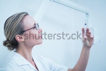 Close up of young woman with sunglasses on white background Stock photo © wavebreak_media