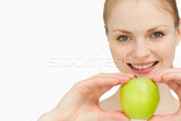 Vesel femeie măr alb mână Imagine de stoc © wavebreak_media