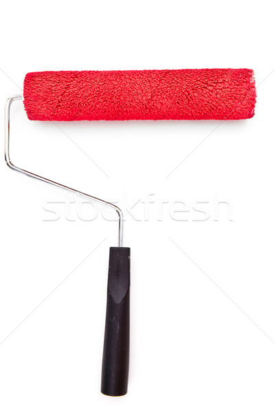 Red paint roller on white background Stock photo © wavebreak_media