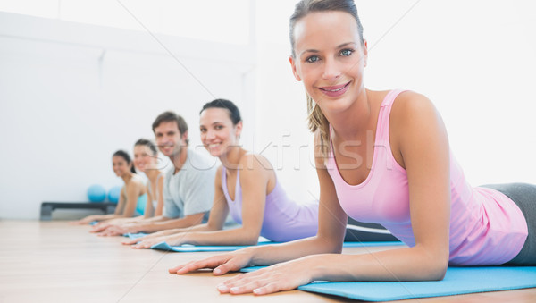 Portrait of fit class exercising at fitness studio Stock photo © wavebreak_media