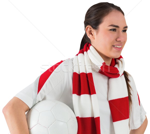 Smiling football fan in white holding ball Stock photo © wavebreak_media