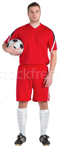 Football player in red holding ball Stock photo © wavebreak_media