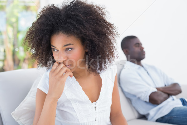 Stock photo: Attractive couple not talking on the couch