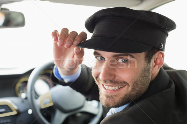 Przystojny kierowca uśmiechnięty kamery samochodu garnitur Zdjęcia stock © wavebreak_media
