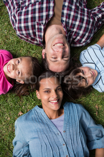 Happy family smiling at camera Stock photo © wavebreak_media