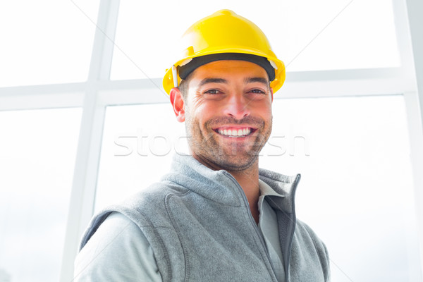 Utasítás munkás visel munkavédelmi sisak épület portré Stock fotó © wavebreak_media