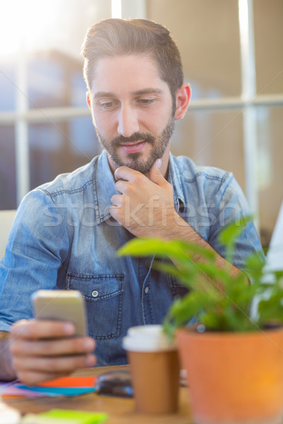 Gündelik işadamı cep telefonu ofis iş Stok fotoğraf © wavebreak_media