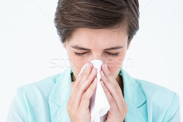 Przypadkowy brunetka dmuchanie nosa biały kobiet wirusa Zdjęcia stock © wavebreak_media