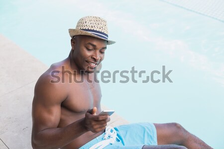 Homme hamac ciel téléphone Photo stock © wavebreak_media