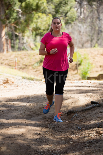 Woman jogging in the boot camp Stock photo © wavebreak_media