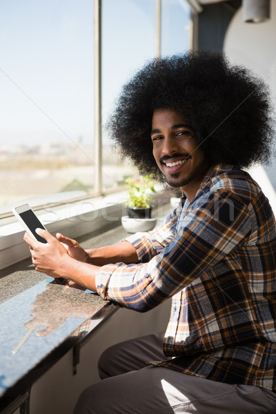 Portre işadamı kıvırcık saçlı dijital tablet pencere Stok fotoğraf © wavebreak_media