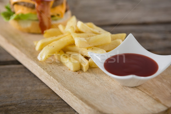 томатном соусе чаши картофель фри разделочная доска улыбаясь Сток-фото © wavebreak_media