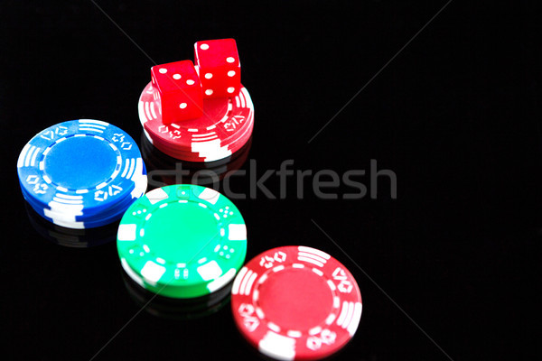 High angle view of red dices with chips Stock photo © wavebreak_media