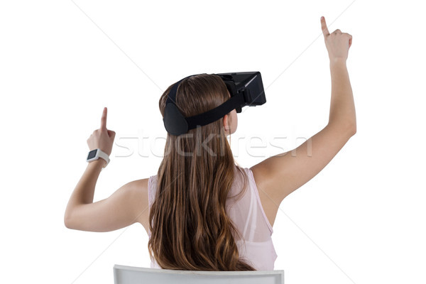 Teenage girl using virtual reality headset Stock photo © wavebreak_media