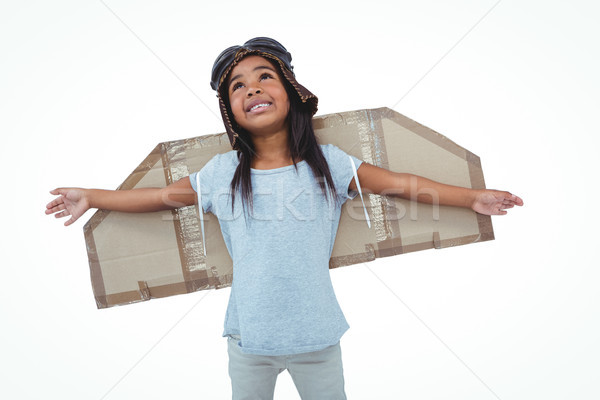 Girl with fake wings pretending to be pilot Stock photo © wavebreak_media