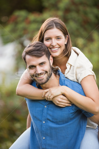 Portrait of man carrying woman  Stock photo © wavebreak_media